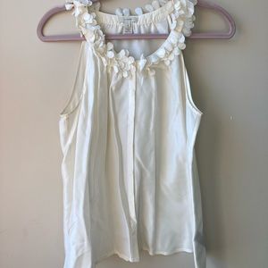 Silky white sleeveless blouse